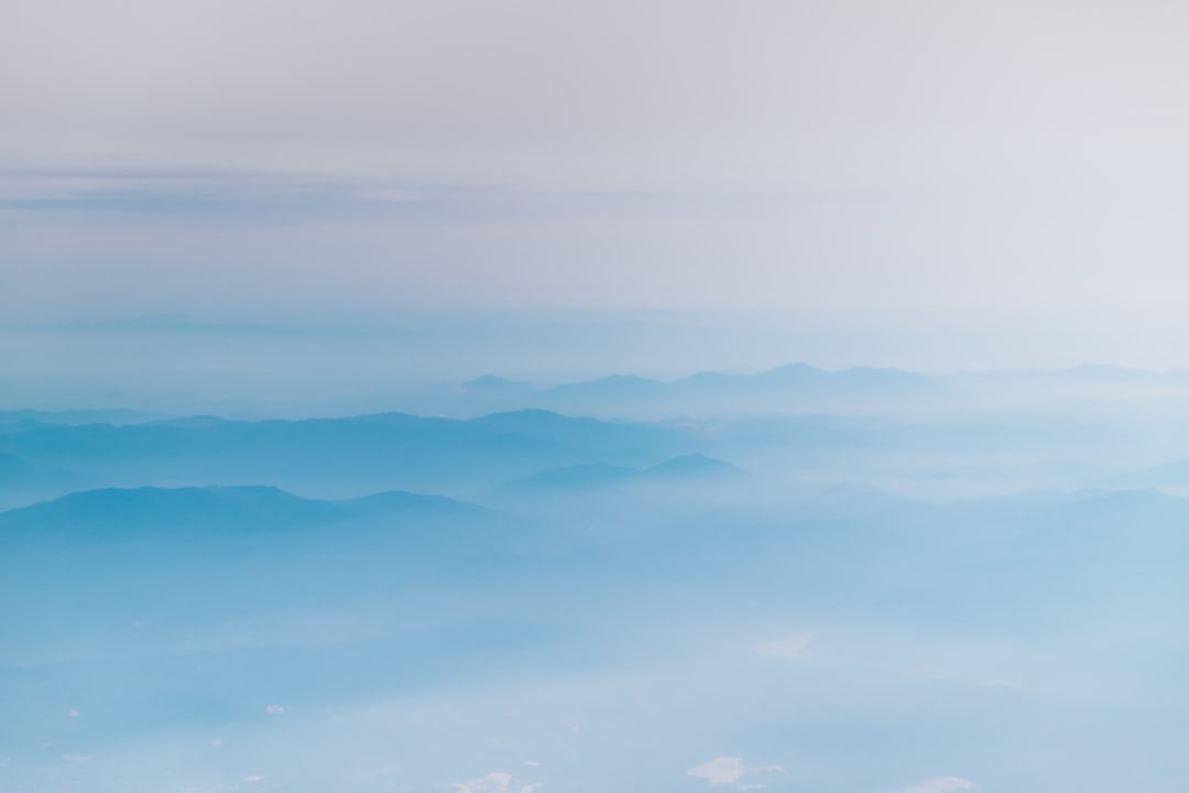 mountain covering with clouds