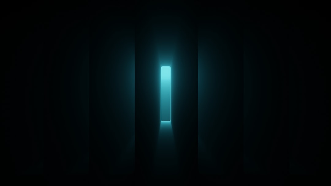a dark room with a light at the end