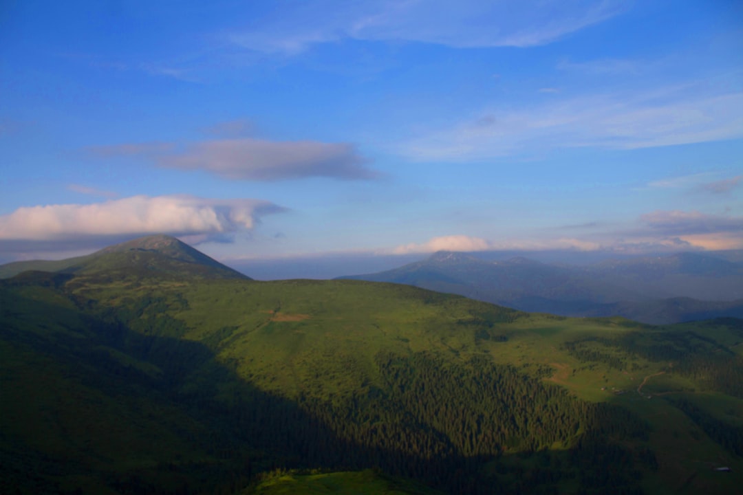 a landscape with hills and trees