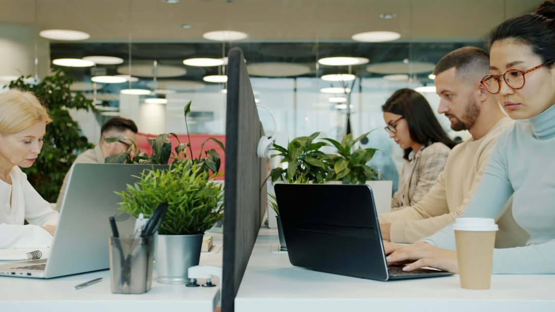 People working at desks in a modern office